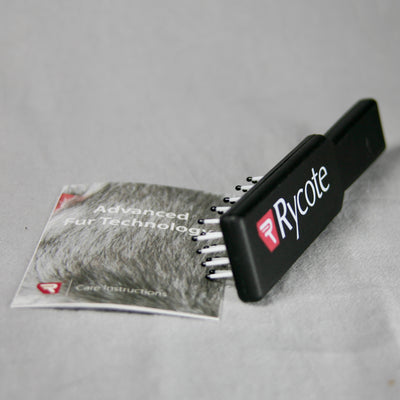 Fur windjammer and grooming brush