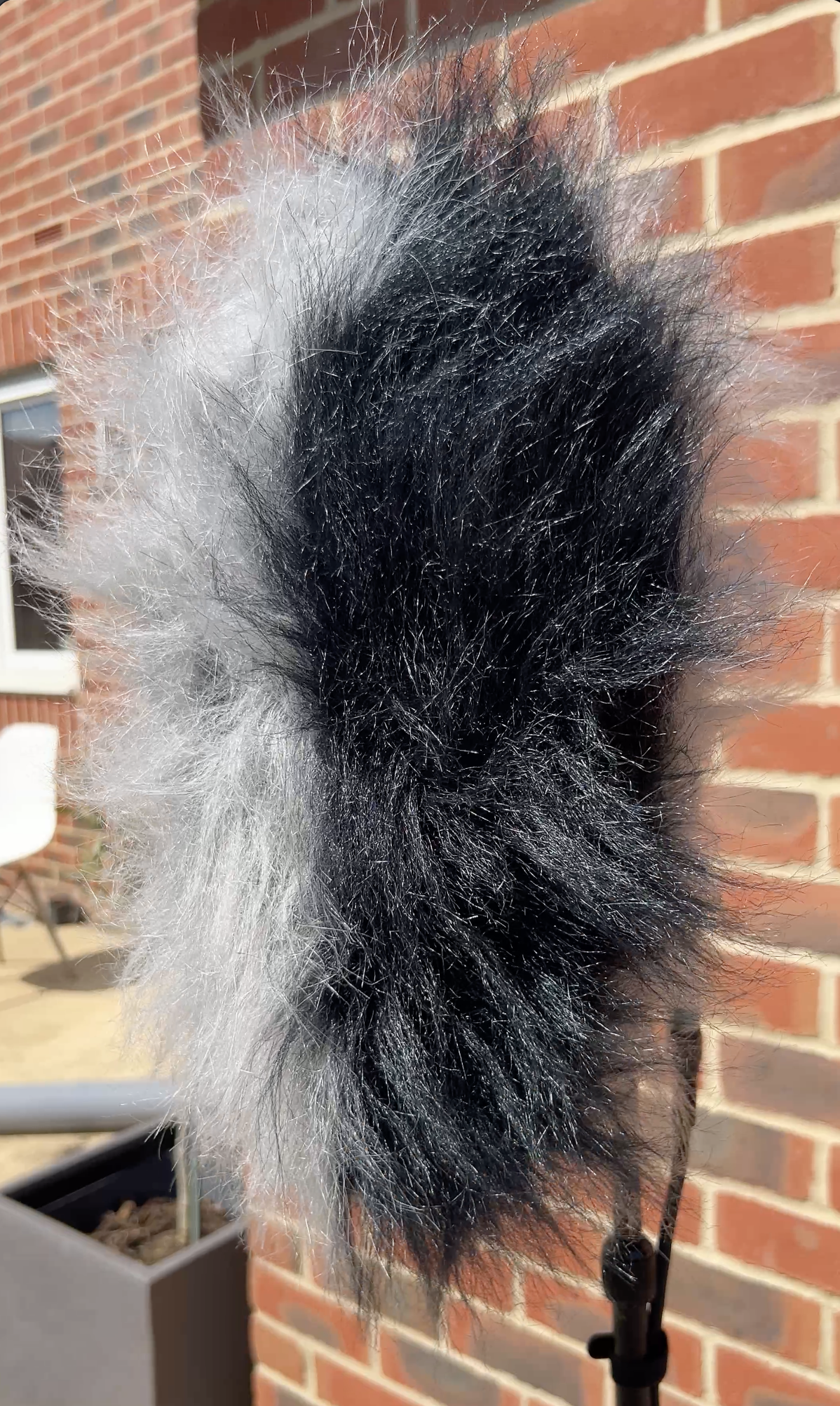 Cinela Pianissimo with fur cover, side view