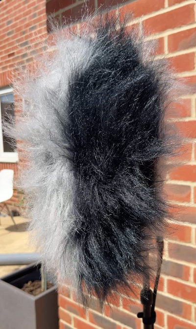 Cinela Pianissimo with fur cover, side view